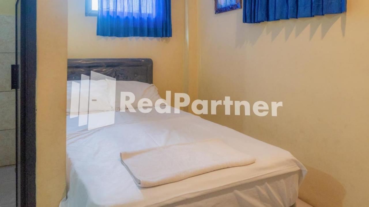 Vandhela Homestay Syariah Mitra Reddoorz スラバヤ エクステリア 写真