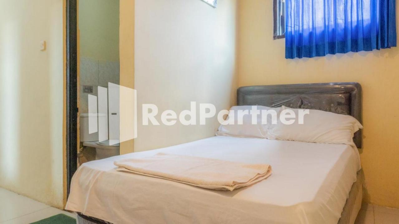 Vandhela Homestay Syariah Mitra Reddoorz スラバヤ エクステリア 写真