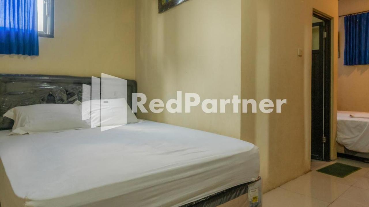 Vandhela Homestay Syariah Mitra Reddoorz スラバヤ エクステリア 写真